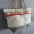 Recycled sailboat handbag made in France