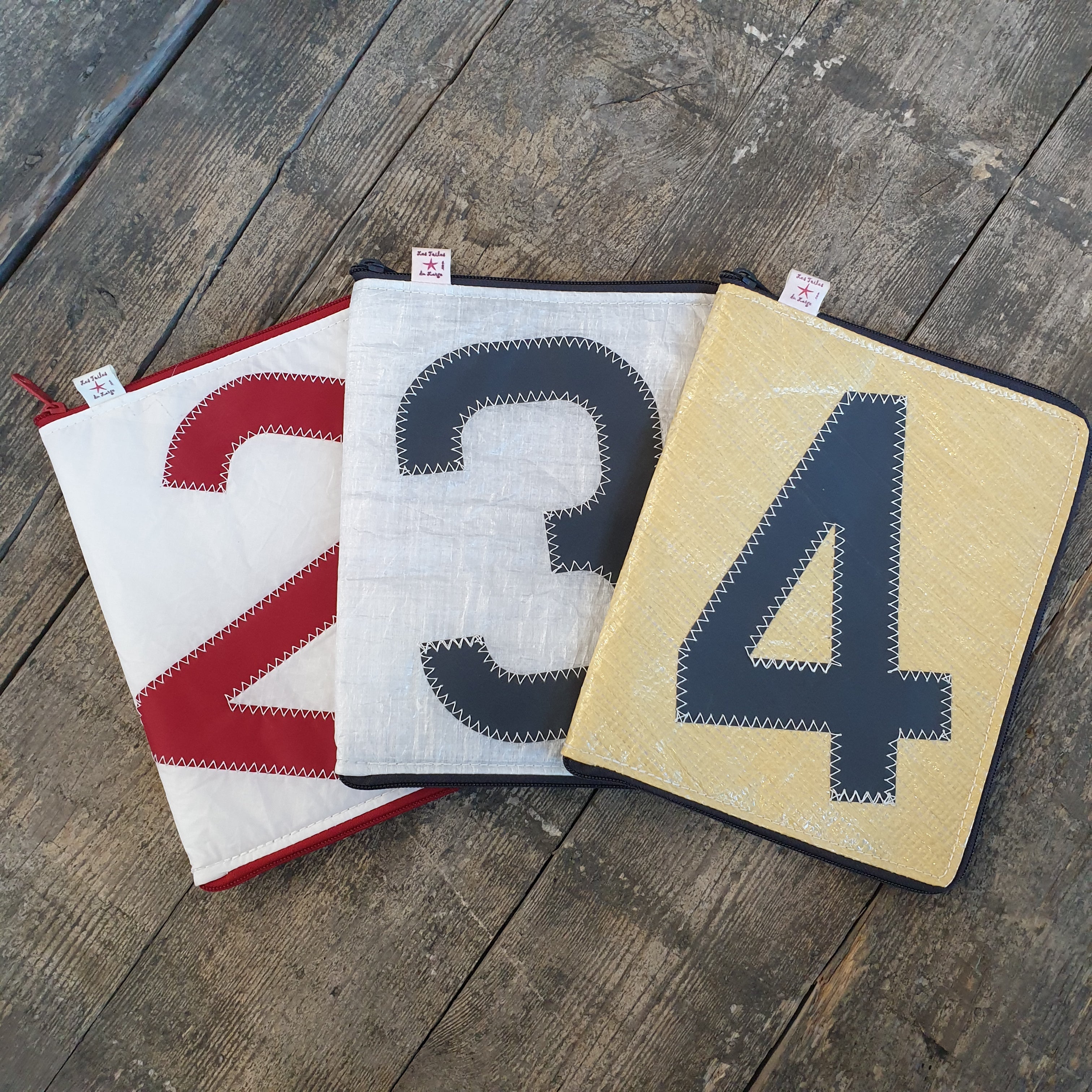 Protect your computer or tablet with a sleeve made from recycled sailcloth