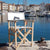 Wooden armchair and recycled boat sail made in france