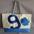 large sail bag painted by cécile colombo in boat sail made in france