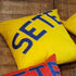 Coussin jaune "SETE"