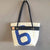 recycled sailcloth handbag les toiles du large in sailcloth made in france