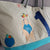 large sail bag painted by cécile colombo in boat sail made in france