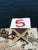 Wooden stool and recycled boat sail made in france